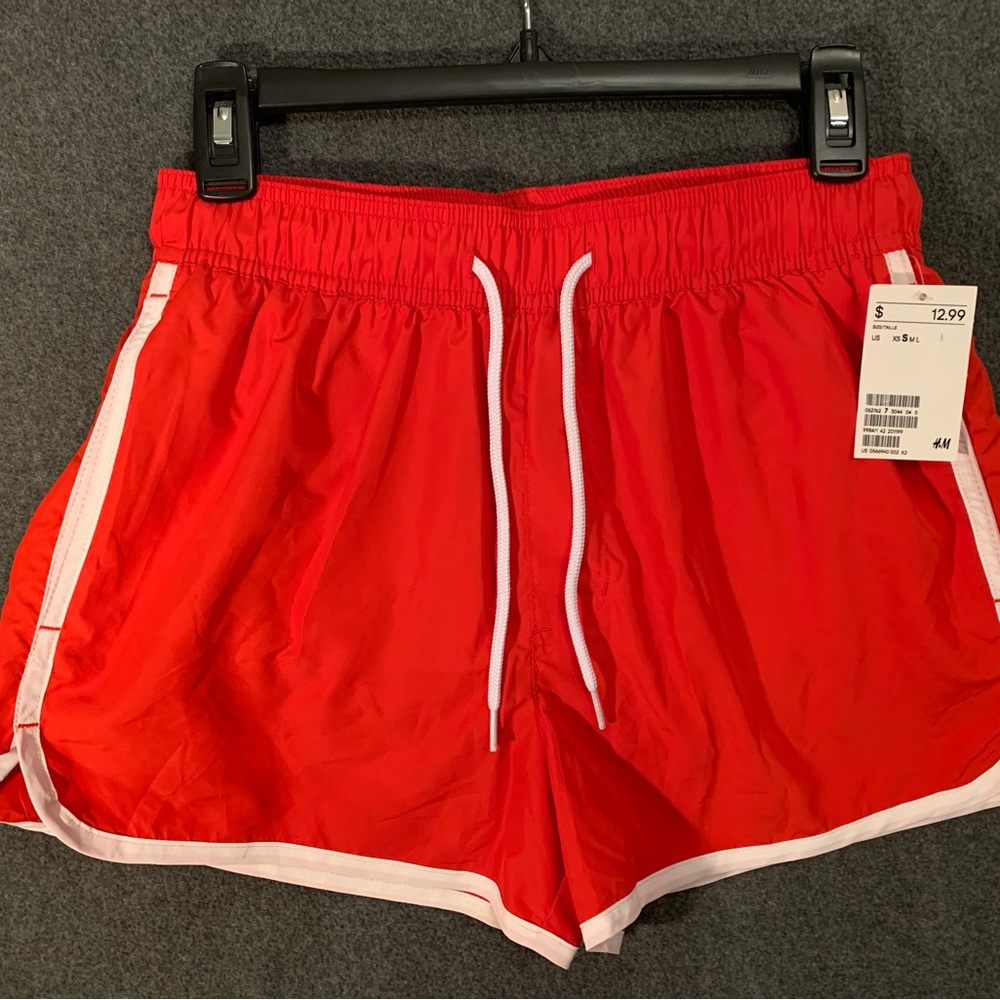 Red & white swim shorts by H&M (new).
